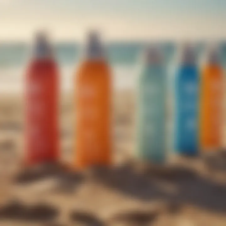 A close-up view of various sunscreen spray bottles on a beach background