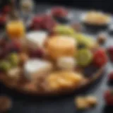 Elegant cheese platter with assorted cheeses and fruits