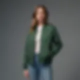 Everlane Green Jacket showcased against a minimalist backdrop, highlighting its design features.