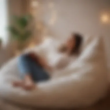 An individual relaxing on a bean bag bed while reading a book