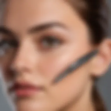 Technique for Using an Eyebrow Razor An instructional visual demonstrating the correct angle for using an eyebrow razor.