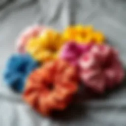 A collection of oversized scrunchies in vibrant colors displayed on a textured background
