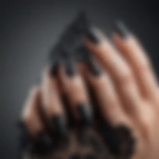 Elegant matte black press-on nails with intricate lace design