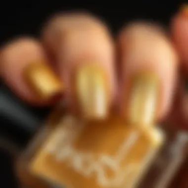 Artistic Nail Design with Gold Glitter Artistic nail design featuring Sally Hansen Gold Glitter Nail Polish