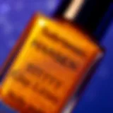 Close-up of Sally Hansen Gold Glitter Nail Polish showcasing its shimmering finish