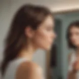 Elegant woman looking at mirror with one-sided thinning hair